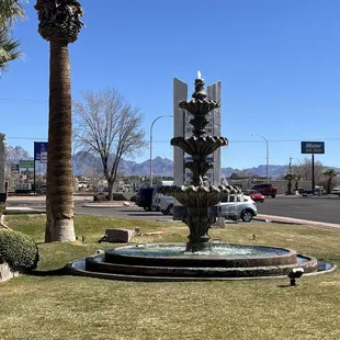 a fountain in the middle of a park