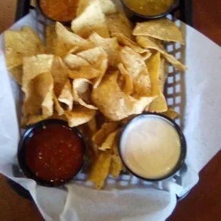 Si Senor&apos;s famous tortilla chips with salsa roja, salsa verde, a bean dip, and sour cream. These accompany each meal.