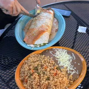 Vegetarian burrito and rice and beans