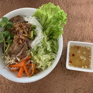 56. Kauy Tiew Moo Yang: Steamed rice noodles, BBQ pork, lettuce, pickled carrot/daikon and cilantro