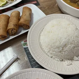 Nicely fried egg rolls &amp; white rice to go with the curry!