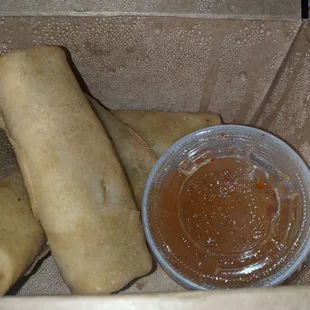 Crispy spring rolls. Veggies and vermicelli noodles. They were crispier an hour ago. Don't judge by the picture