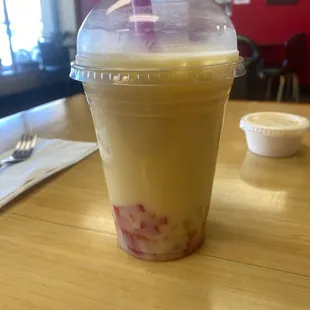 Mango milk bubble tea with brown sugar jelly balls