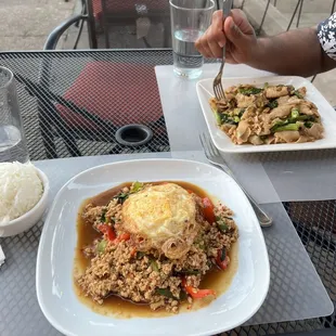 Kaprow minced chicken with fried egg and 73. Pad See Ew