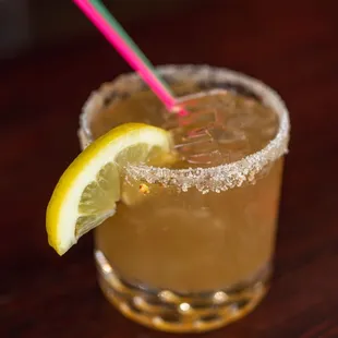 Spicy Lemon Tamarind cocktail with sugar/salt chilli rim.