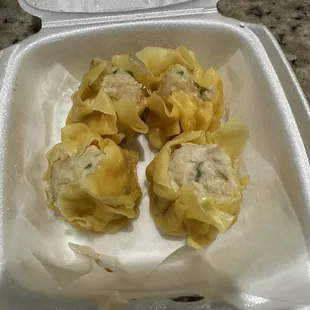 Steamed dumplings. Needs seasoning.