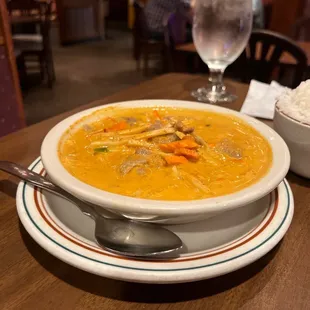 a bowl of soup and rice