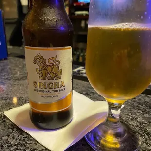 Singha beer in an ice cold glass.