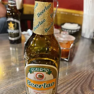 a bottle of beer on a table