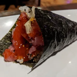 Hand roll unnecessarily soaked in fake sauce