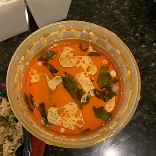 a bowl of soup and rice