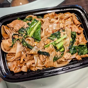 Pad see-ew featured thinly sliced beef and Chinese broccoli leaves. I should have gotten it with regular broccoli because they were tough.