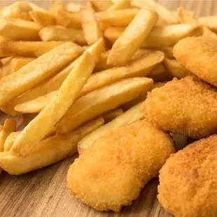 Kid's Chicken Nuggets - Chicken nuggets served with french fries