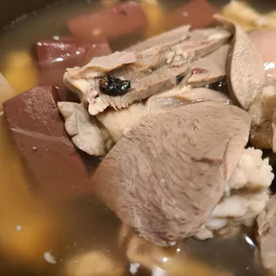 Look what I found in my togo order soup after I dumped everything into my small pot and was going to heat it up.