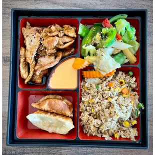 Hibachi chicken, fresh steamed vegetables, pork potstickers, and fried rice!