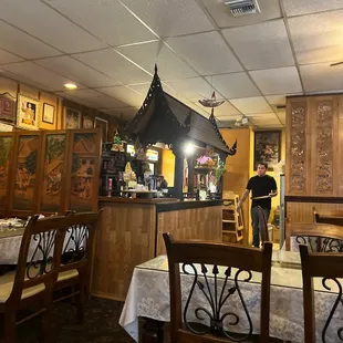 a man standing in a restaurant