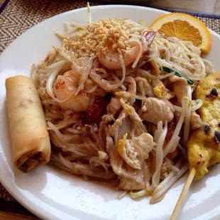 The best pad Thai lunch special! Served with chicken satay and a spring roll!