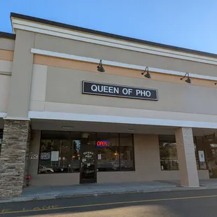 Outside. Storefront. Front entrance. Located in the Timberlyne Village shopping center with Food Lion.