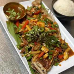 a plate of stir fried vegetables