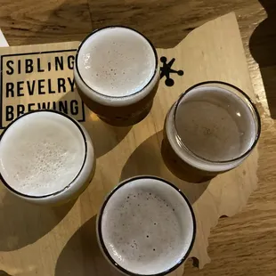 four glasses of beer