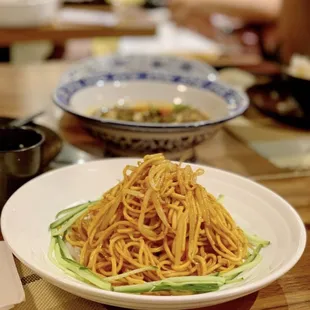 a plate of noodles on a table