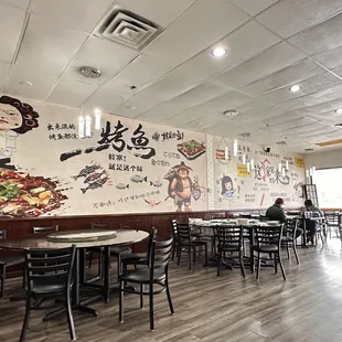 Looks at this bad ass lady wall painting