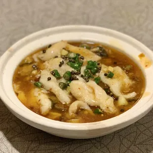 a bowl of soup on a table