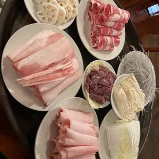 Pork, lotus, beef, cabbage, sweet potato vermicelli, pork kidney, enoki mushrooms