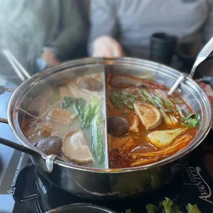 two people sitting in the background