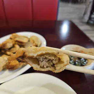 Meat stuffing inside eggplant boxes