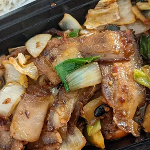 Twice cooked pork - basically thick bacon strips, cooked szechuan style.