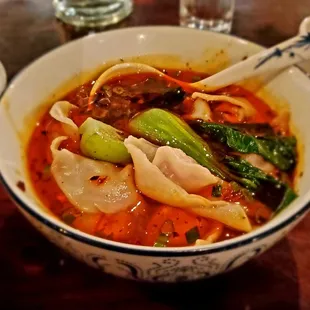 Hand-wrapped wonton soup - made spicy