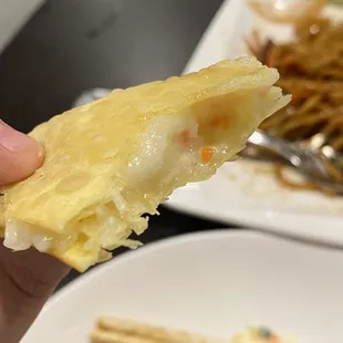 Crab rangoons - I believe it includes a small amount of cabbage and green onion!