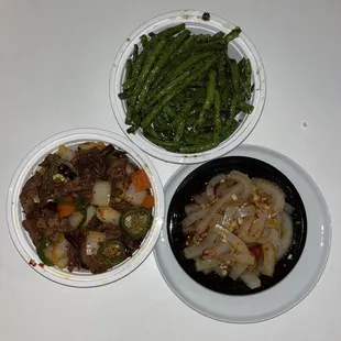 three plates of food on a table