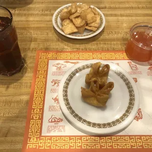 a plate of fried food and a drink