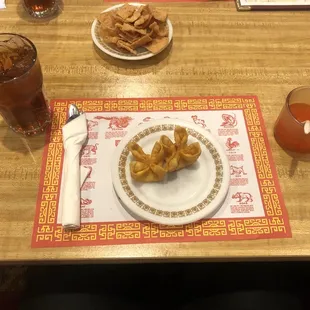 Crab rangoon, sweet iced tea, sweet &amp; sour sauce + chips