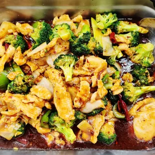 chicken and broccoli in a pan