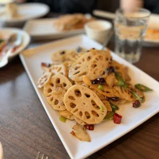 C11. Sautéed Lotus Roots w/meat