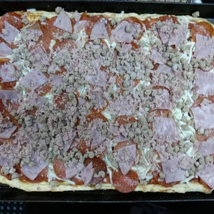 Half sheet meat lover pizza .