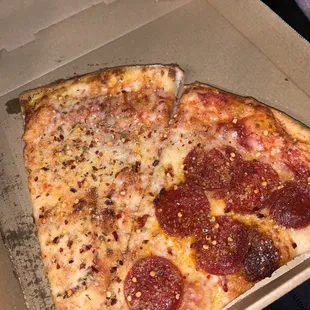 two slices of pepperoni pizza