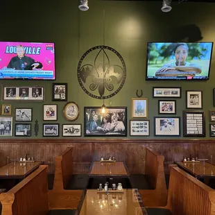 a wall full of pictures