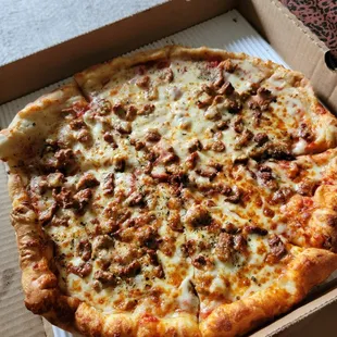 Large Sausage Pizza. 3/4 Cooked for more doughy bite.