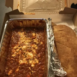 Baked "feta" aka tub of cheap marinara sauce.