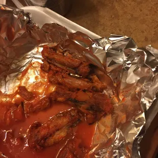 a piece of meat wrapped in foil