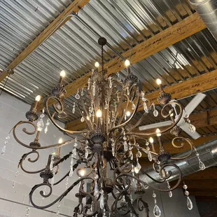 a chandelier in a warehouse