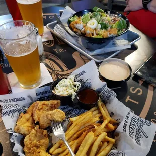 Chicken basket with koren bbq sauze, also a couple tall Remedy Queen Bee beers and a Cali Avacado Salad.