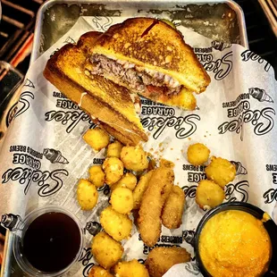 Pizza burger with cheese curds and mozzarella stick stragglers...(spicy honey garlic and beer cheese dips)