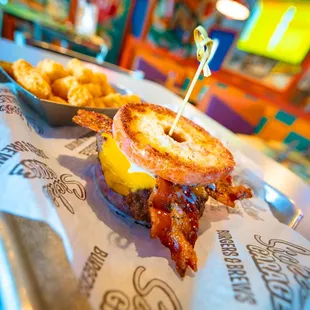 bacon and cheese on a bun