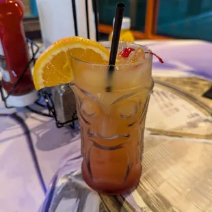Tiki drink made with rum - 10 dollars