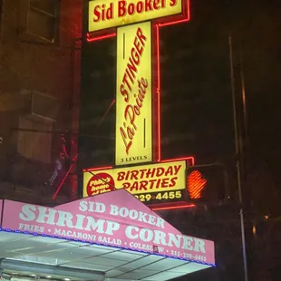 a neon sign for a restaurant